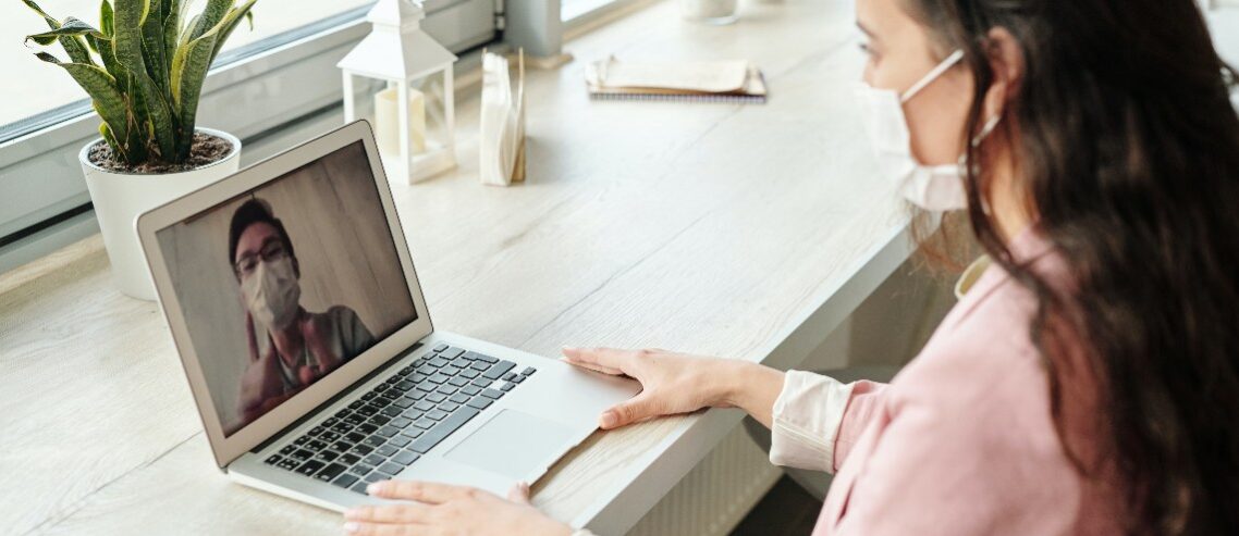 Lady looking at laptop screen - healthcare trends