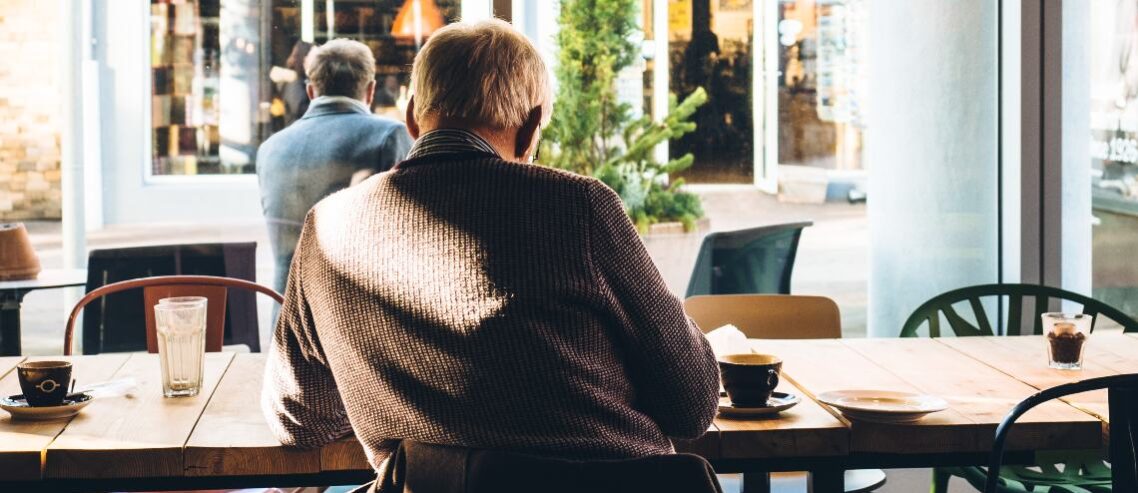 Senior man in cafe